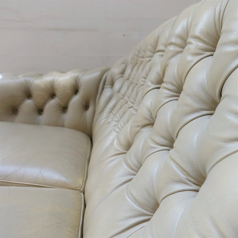 Vintage sofa in champagne fabric
