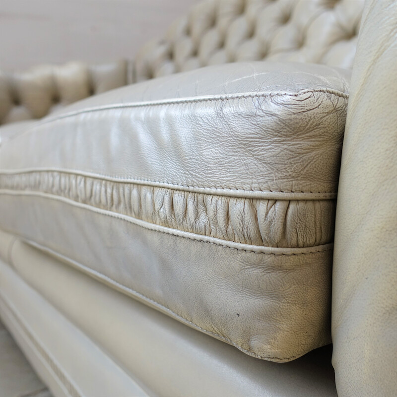 Vintage sofa in champagne fabric