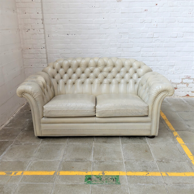 Vintage sofa in champagne fabric