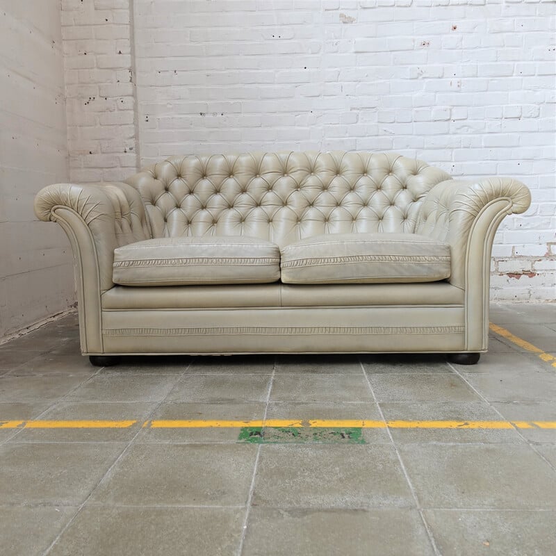 Vintage sofa in champagne fabric