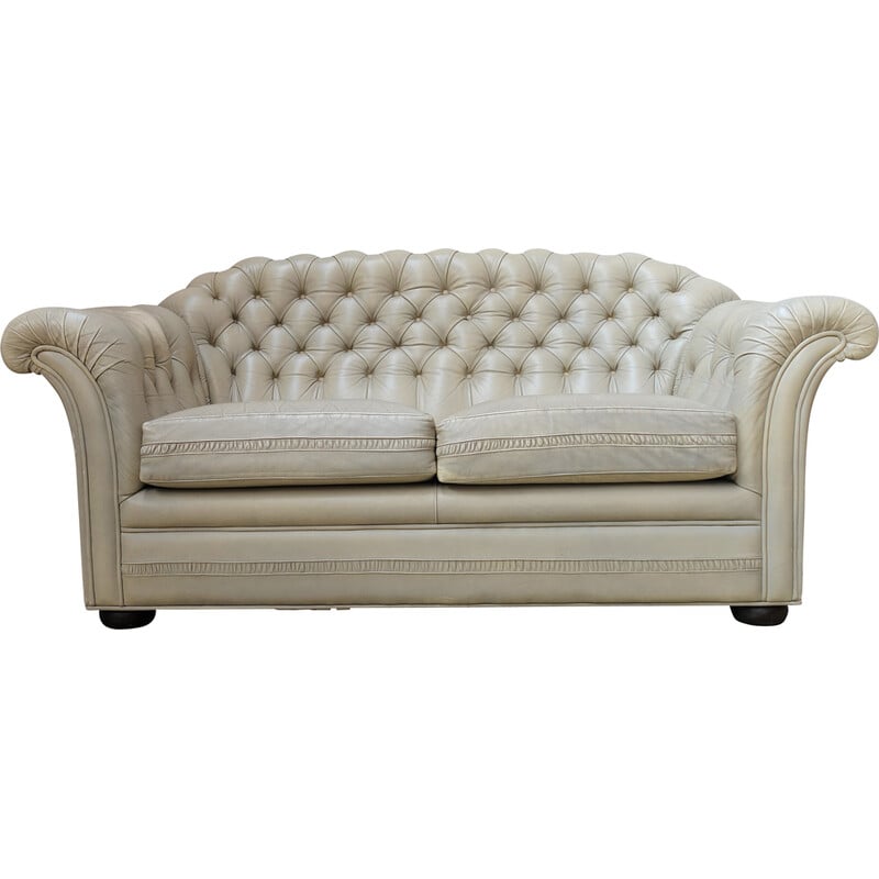 Vintage sofa in champagne fabric
