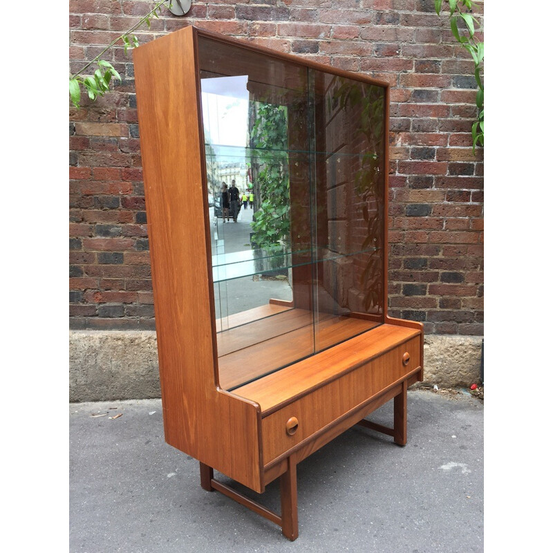 Bookcase with display on teck legs - 1960s