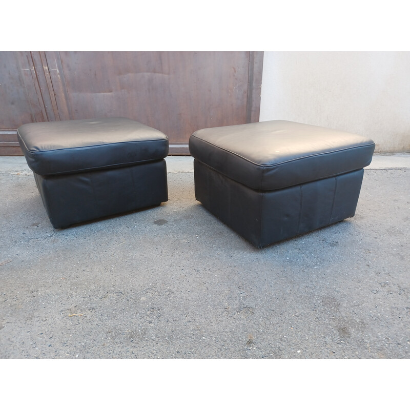 Pair of vintage black leather poufs