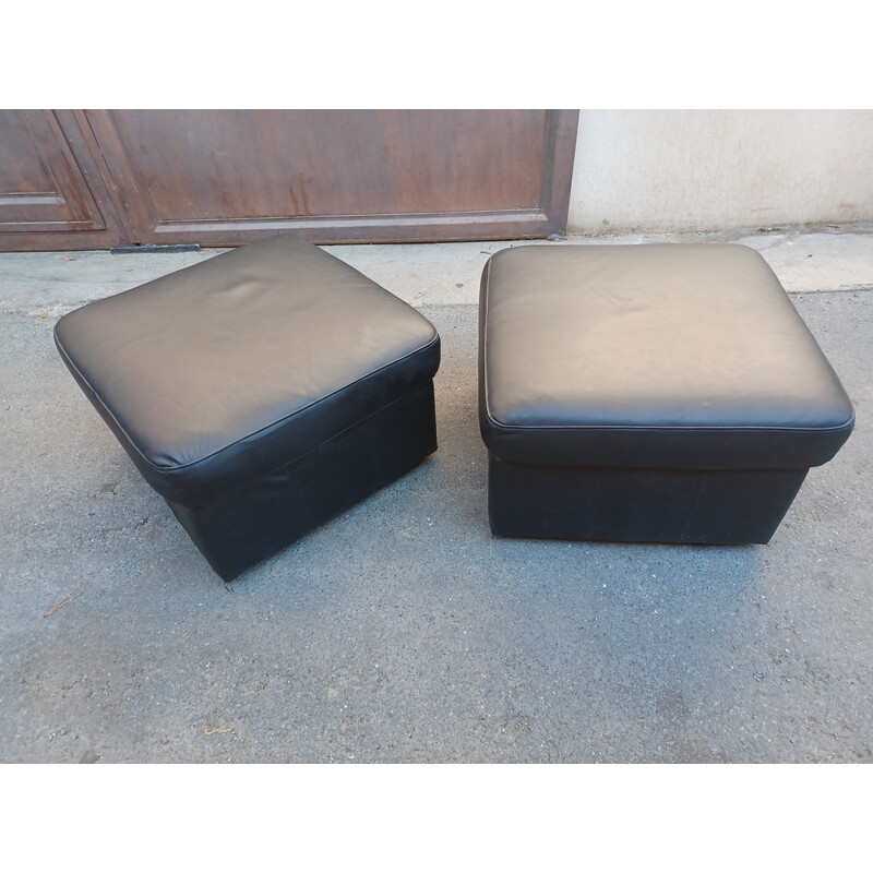 Paire de poufs vintage en cuir noir