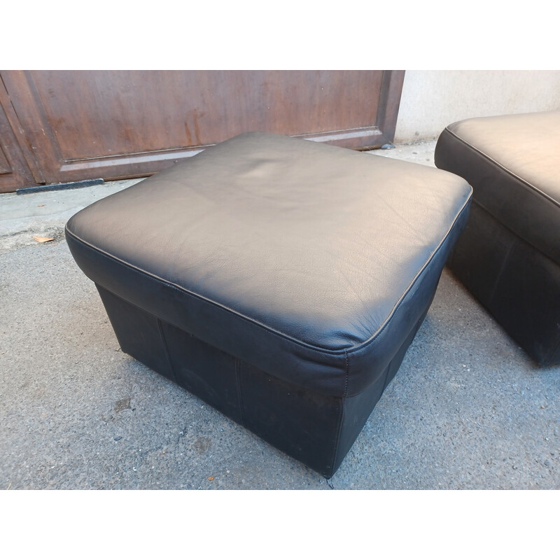 Paire de poufs vintage en cuir noir