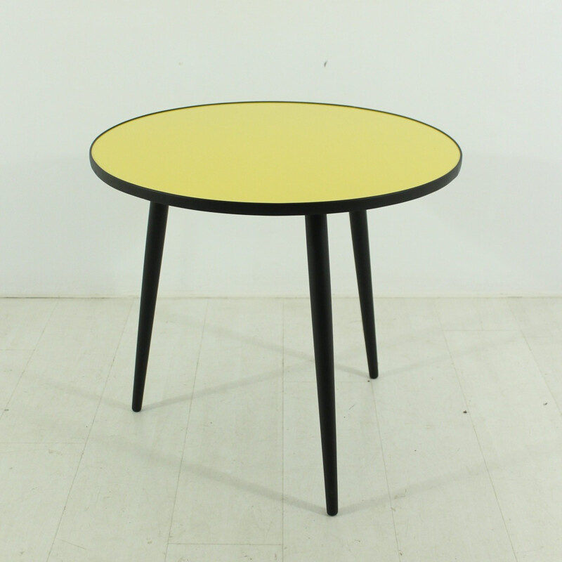 Round yellow and black coffee table - 1950s