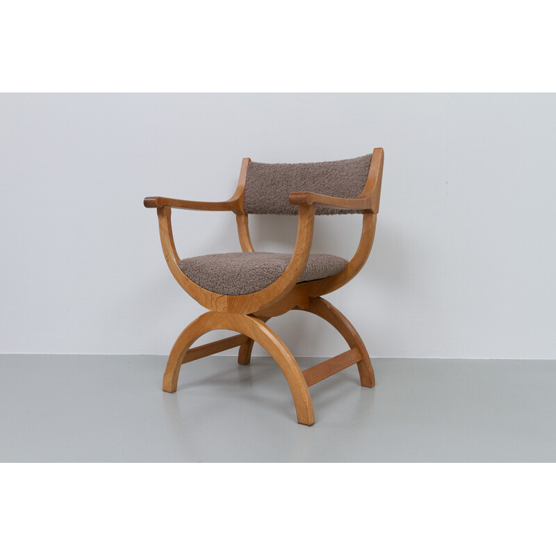 Vintage Kurul armchair in oak by Henning Kjærnulf, Denmark 1960