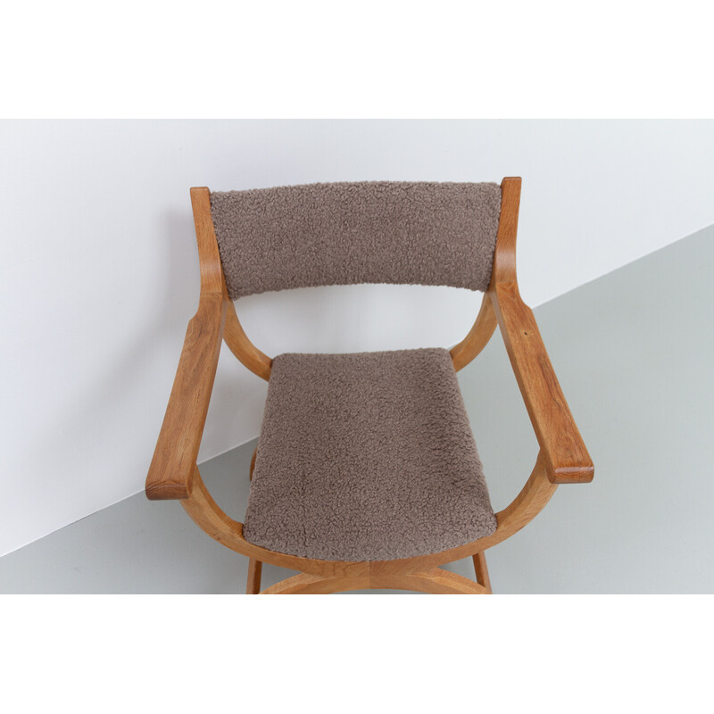 Vintage Kurul armchair in oak by Henning Kjærnulf, Denmark 1960