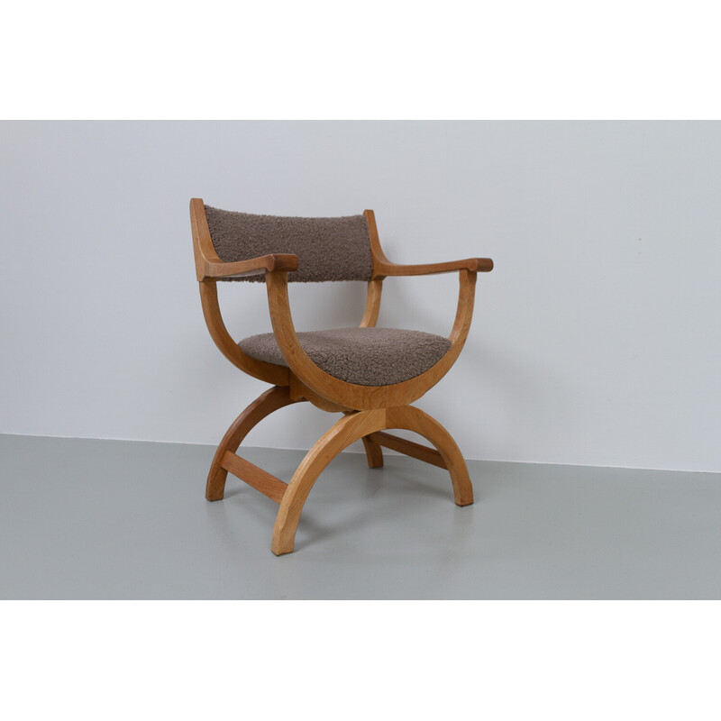Vintage Kurul armchair in oak by Henning Kjærnulf, Denmark 1960