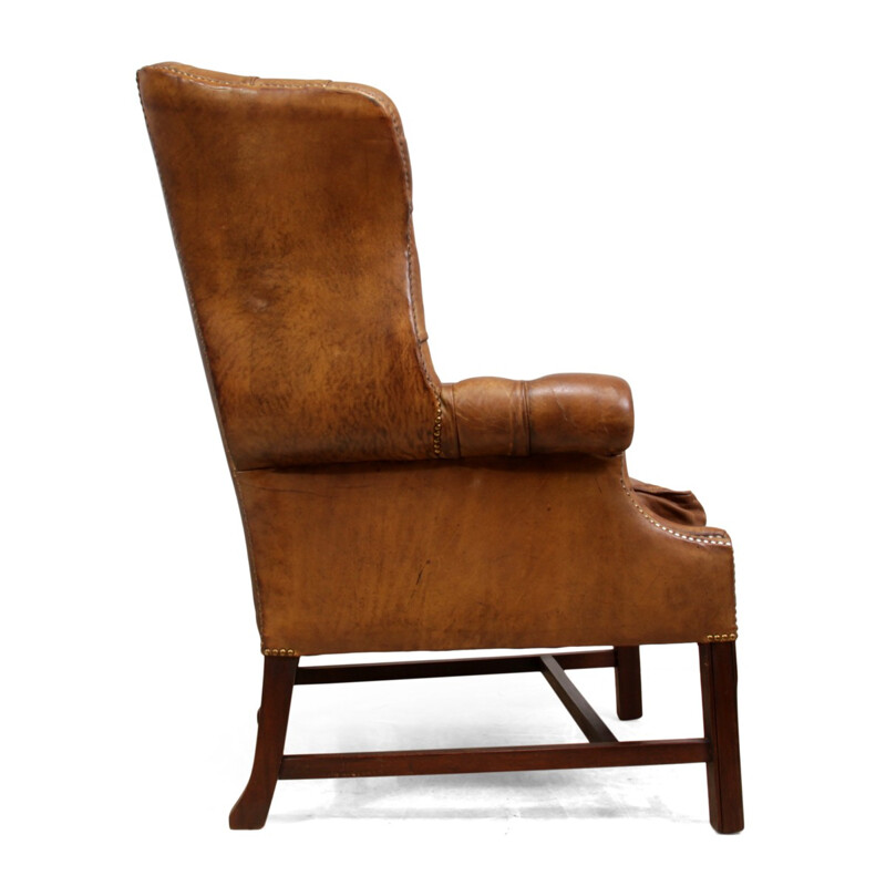 Fauteuil vintage en cuir et piétement en acajou massif - 1960