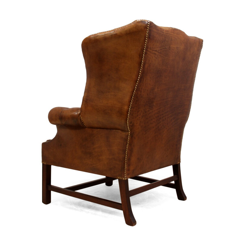 Fauteuil vintage en cuir et piétement en acajou massif - 1960