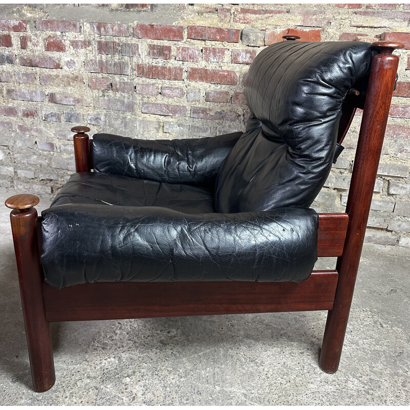 Vintage Admiral armchair in black leather and wood with ottoman by Erik Merthen, Sweden 1960