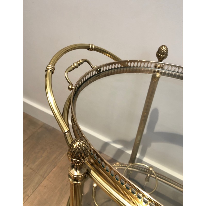 Vintage oval brass rolling table for Maison Baguès, France 1940