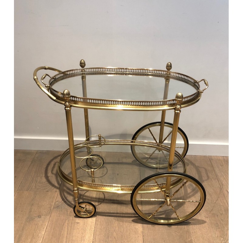 Vintage oval brass rolling table for Maison Baguès, France 1940