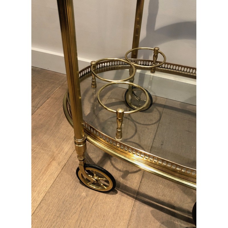 Vintage oval brass rolling table for Maison Baguès, France 1940