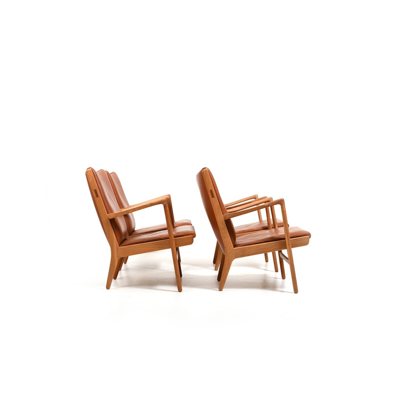 Ensemble de 4 fauteuils vintage en chêne et cuir cognac par Hans J. Wegner pour AP Stolen, Danemark 1951
