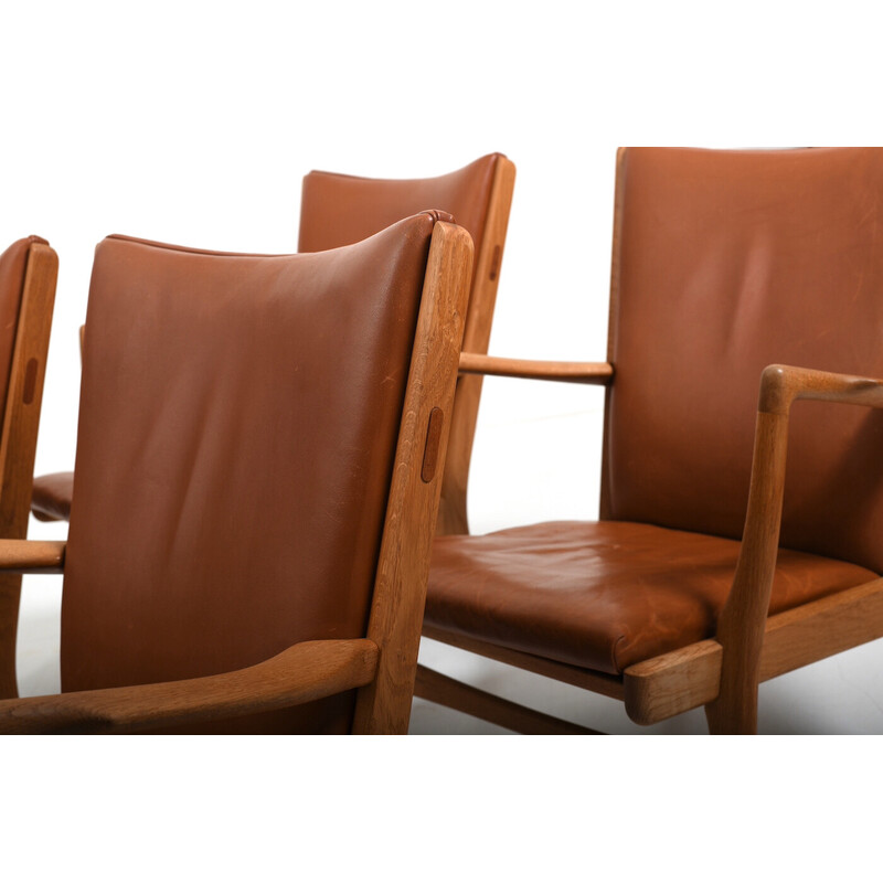 Ensemble de 4 fauteuils vintage en chêne et cuir cognac par Hans J. Wegner pour AP Stolen, Danemark 1951