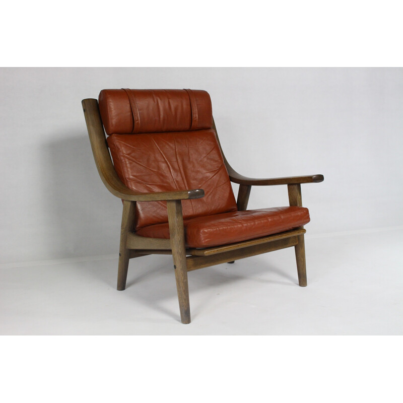 Brown leather easy chair by Hans J. Wegner for Getama - 1970s