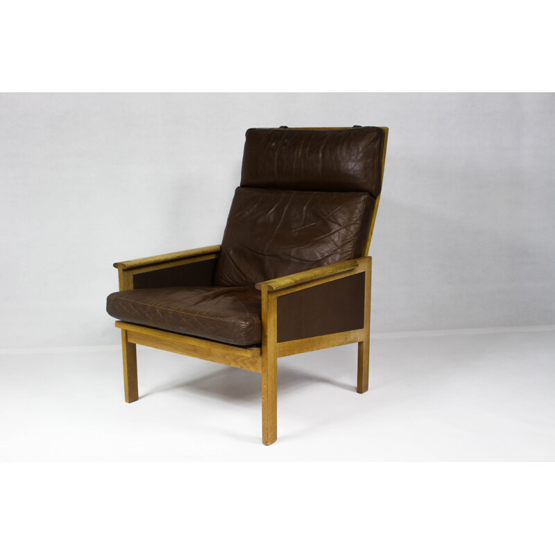 Fauteuil lounge Capella en cuir à dossier haut par Illum Wikkelsø - 1960