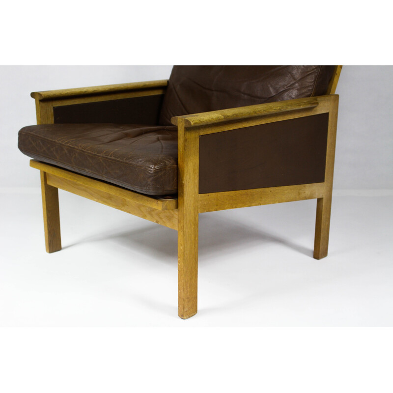 Fauteuil lounge Capella en cuir à dossier haut par Illum Wikkelsø - 1960