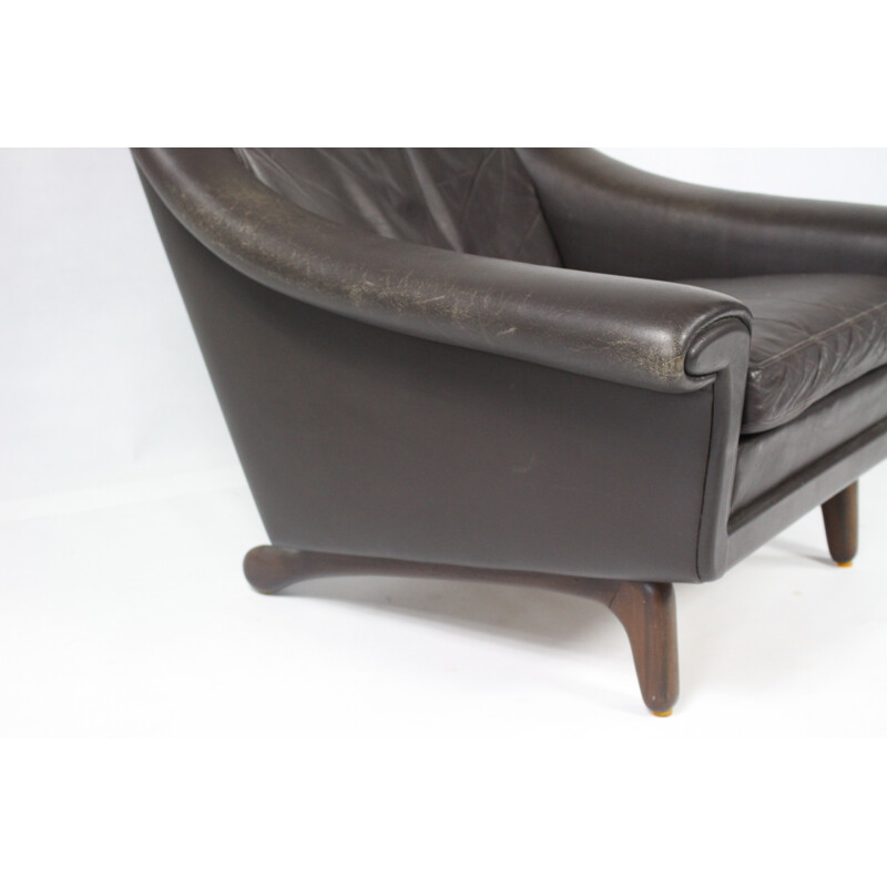 Leather armchair with ottoman in rosewood - 1970s