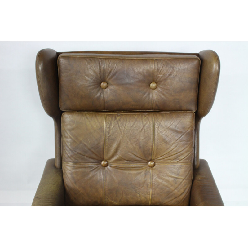 Fauteuil à dossier haut marron en cuir vintage - 1970