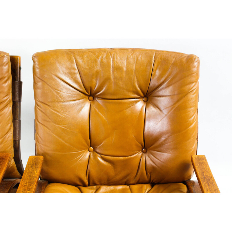 Paire de fauteuils marron scandinaves en cuir - 1970