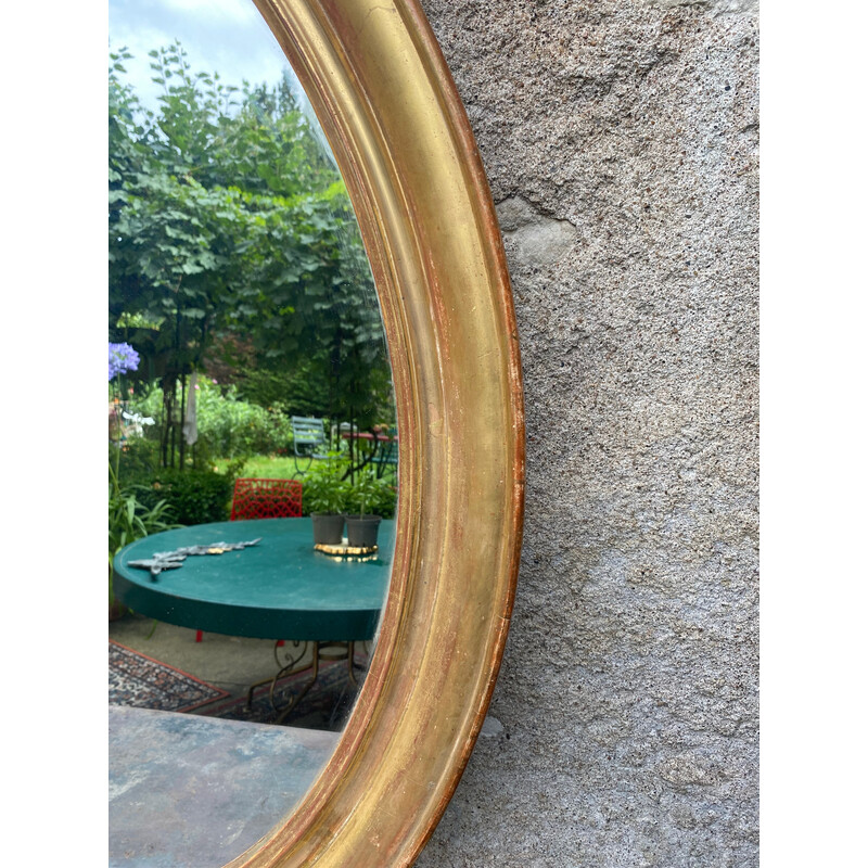 Vintage gilded oval mirror