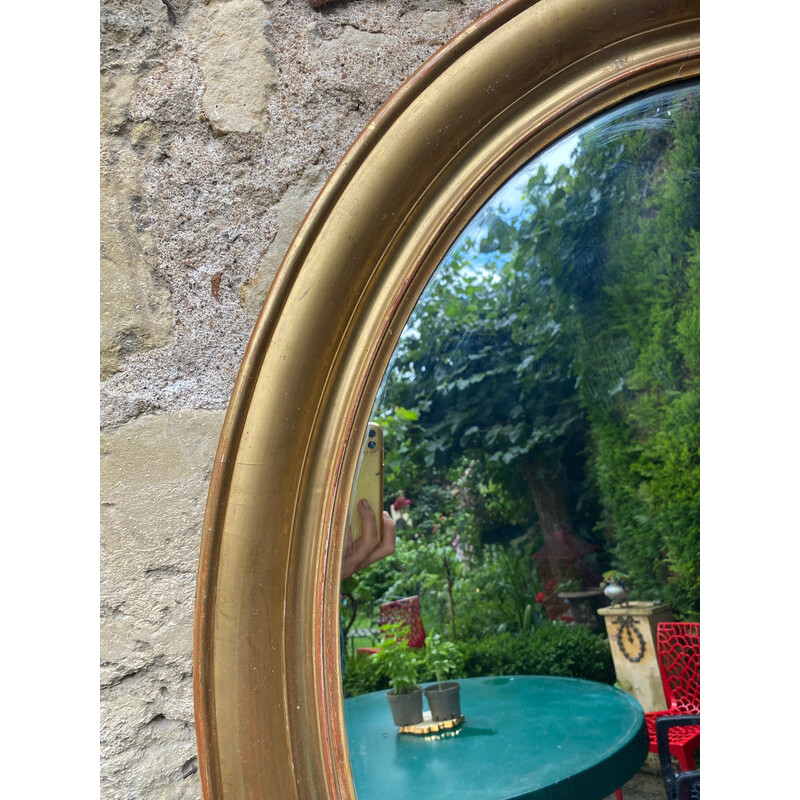 Vintage gilded oval mirror