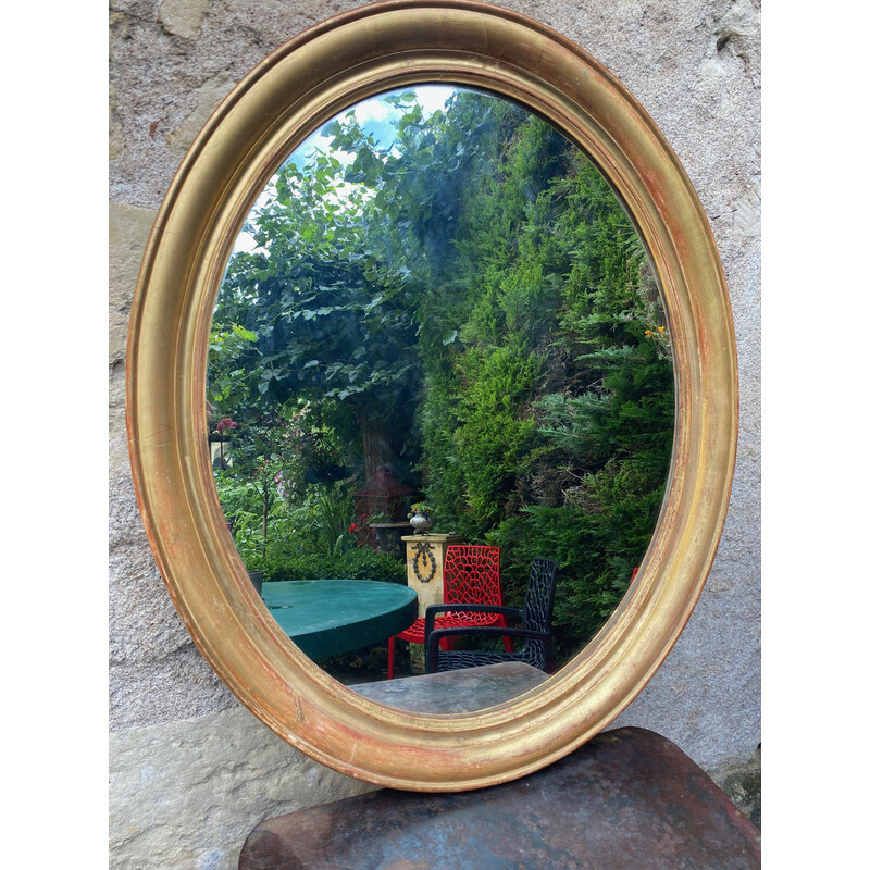 Vintage gilded oval mirror