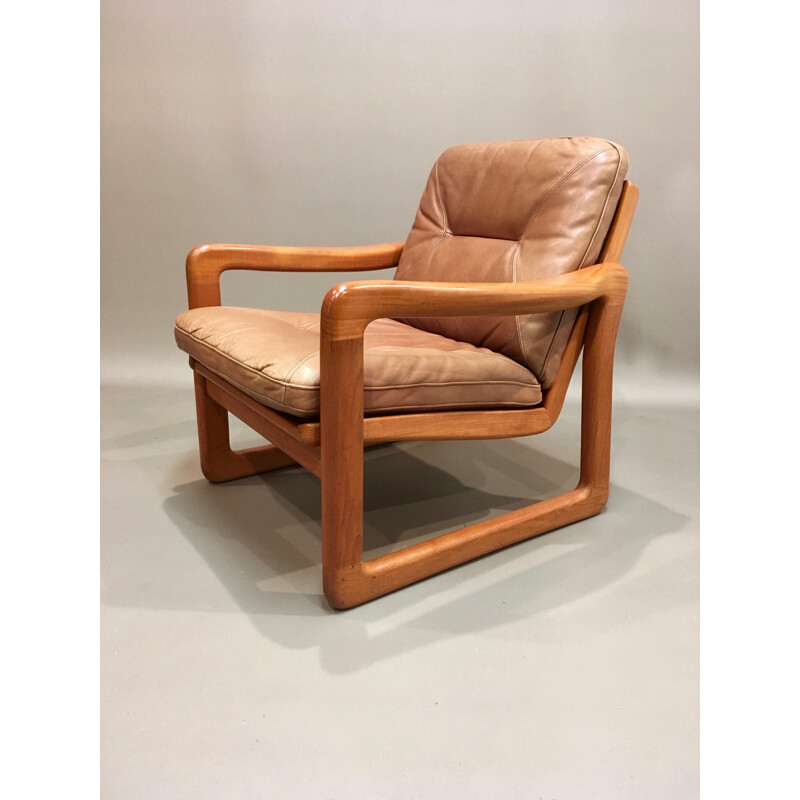 Brown Scandinavian armchair in teak and leather - 1950s