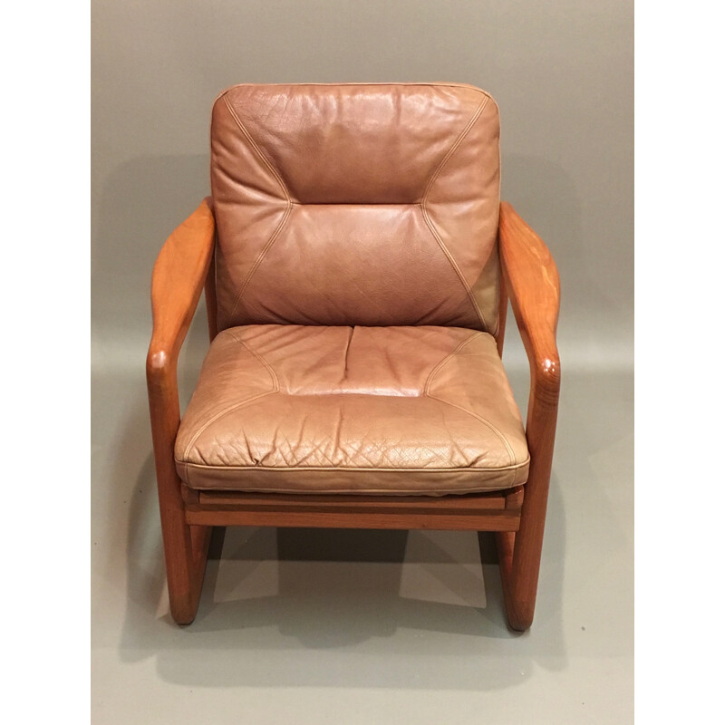 Brown Scandinavian armchair in teak and leather - 1950s