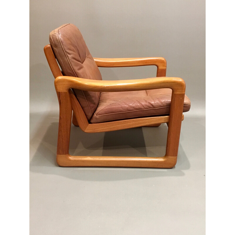 Brown Scandinavian armchair in teak and leather - 1950s