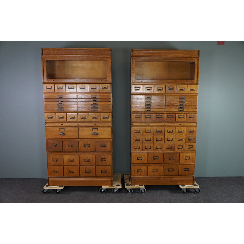 Pair of vintage oak medicine cabinets with plenty of storage space, 1900