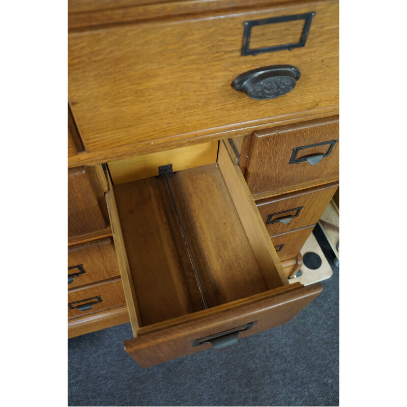 Pair of vintage oak medicine cabinets with plenty of storage space, 1900