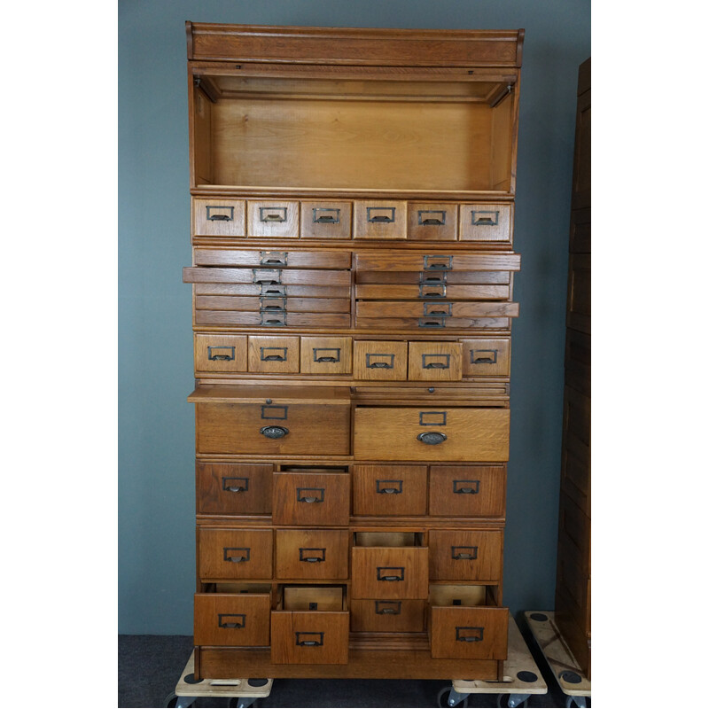 Pair of vintage oak medicine cabinets with plenty of storage space, 1900