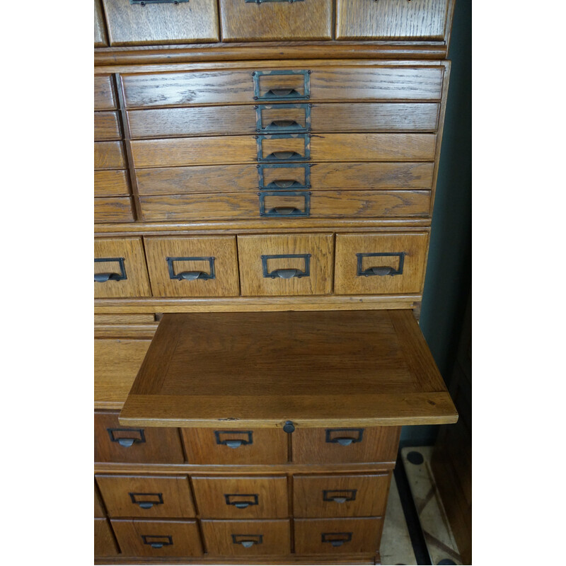 Pair of vintage oak medicine cabinets with plenty of storage space, 1900
