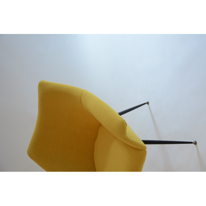 Yellow shell armchair in iron and fabric - 1970s