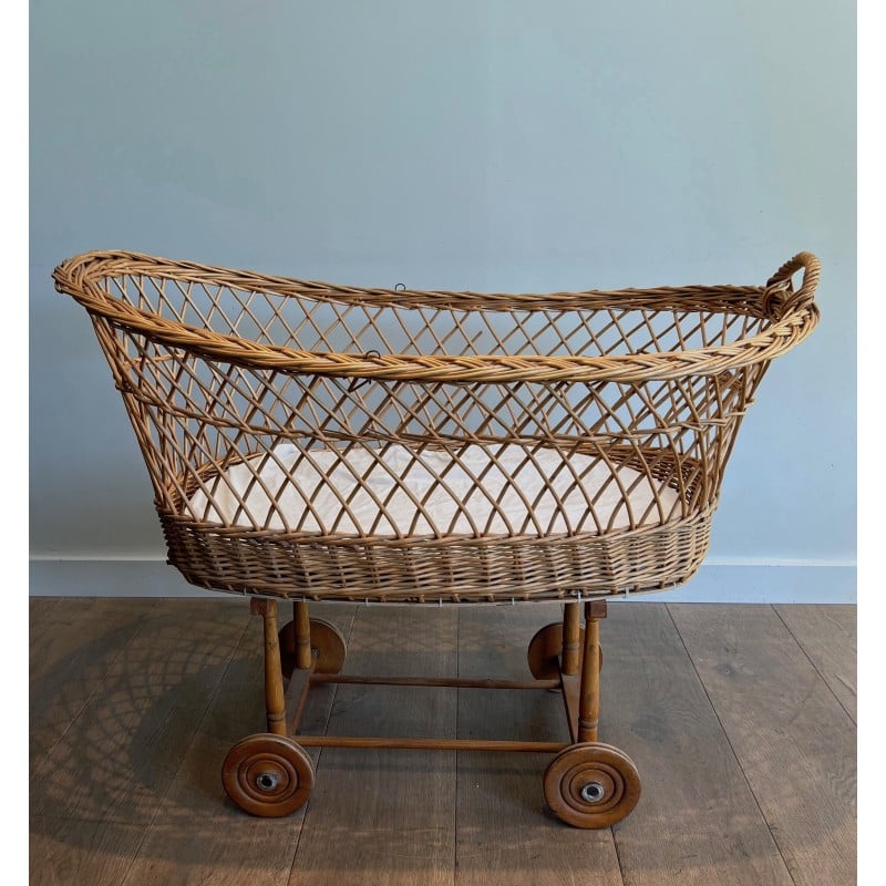 Vintage rattan cradle on wheels, France 1950