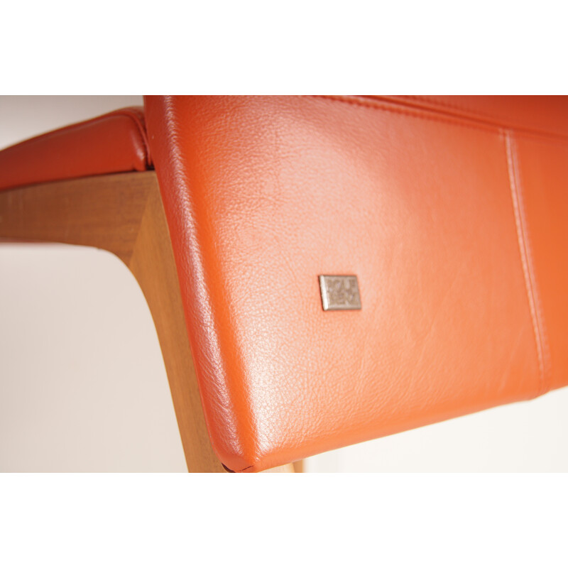 Vintage orange leather chairs by Rolf Benz