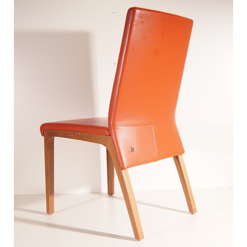 Vintage orange leather chairs by Rolf Benz