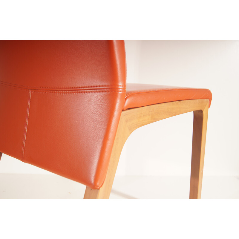 Vintage orange leather chairs by Rolf Benz