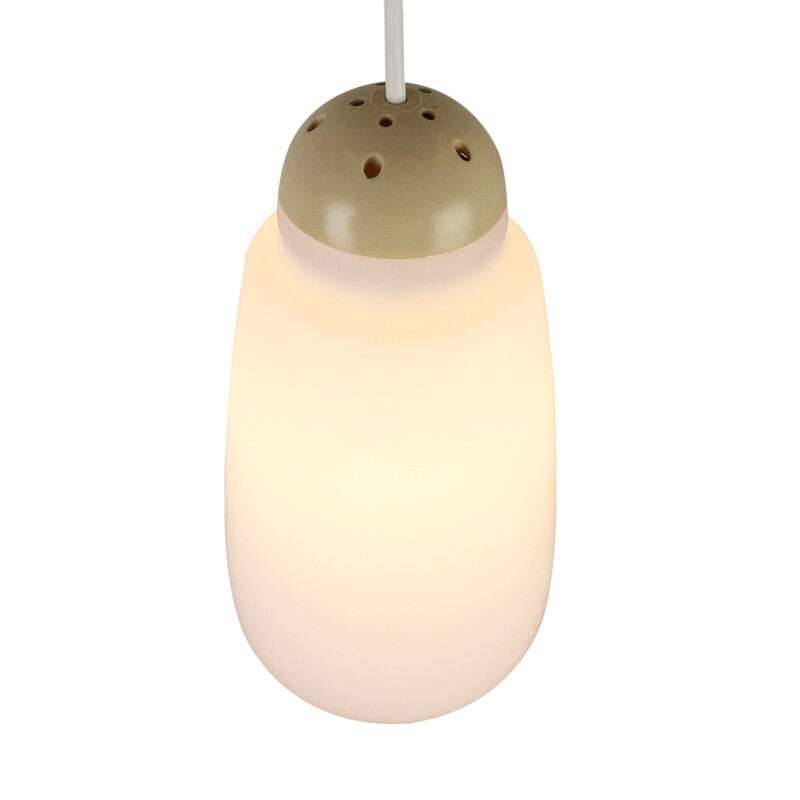 Glass hanging lamp produced by Philips with a creme colored top - 1960s