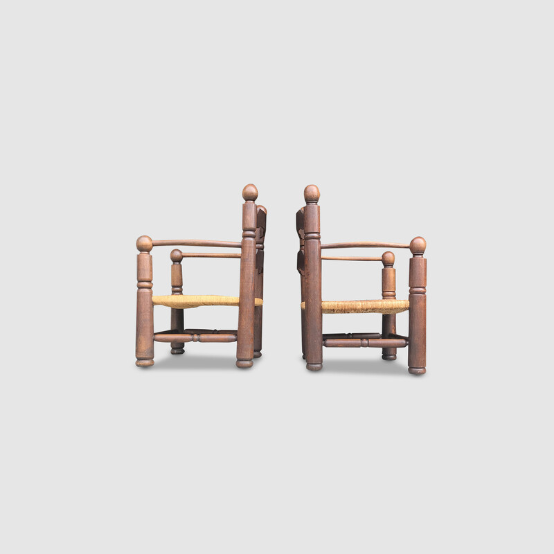 Paire de fauteuils de cheminée vintage en chêne et osier par Charles Dudouyt, France 1950