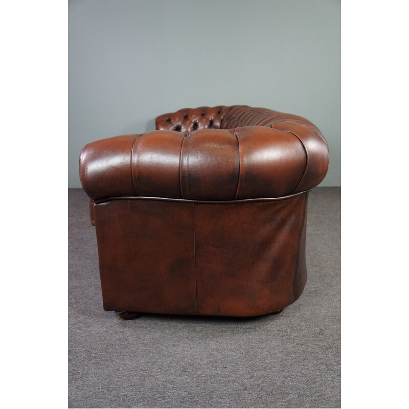 Vintage chesterfield sofa in cowhide leather