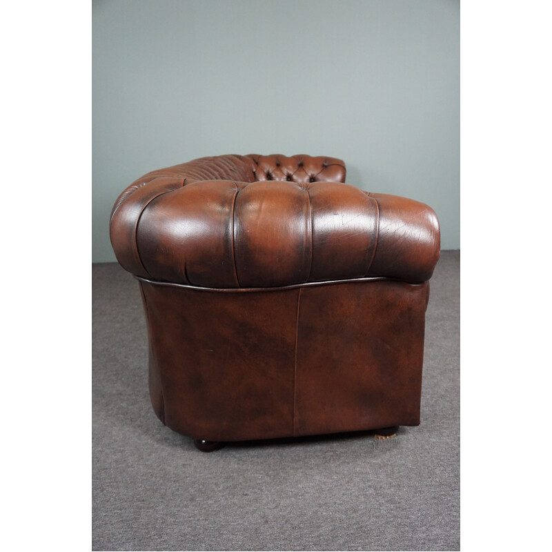 Vintage chesterfield sofa in cowhide leather