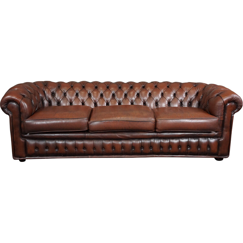 Vintage chesterfield sofa in cowhide leather