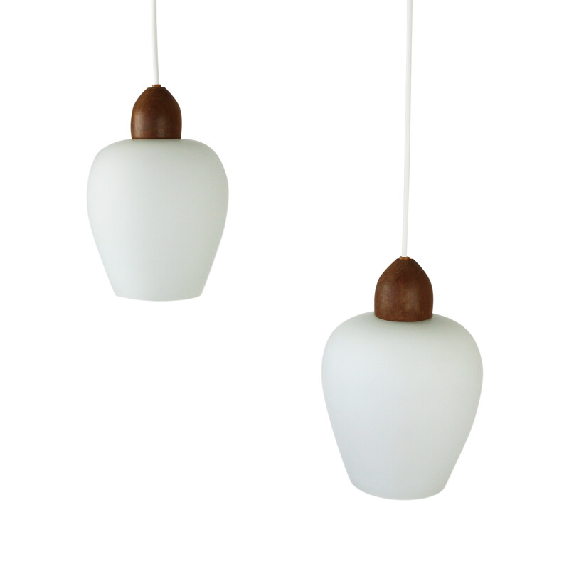 Pair of Scandinavian milk glass and teak pendants - 1960s