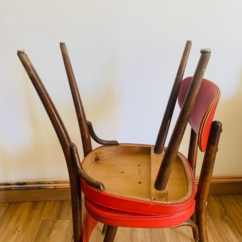 Paire de chaises vintage en hêtre et skaï rouges