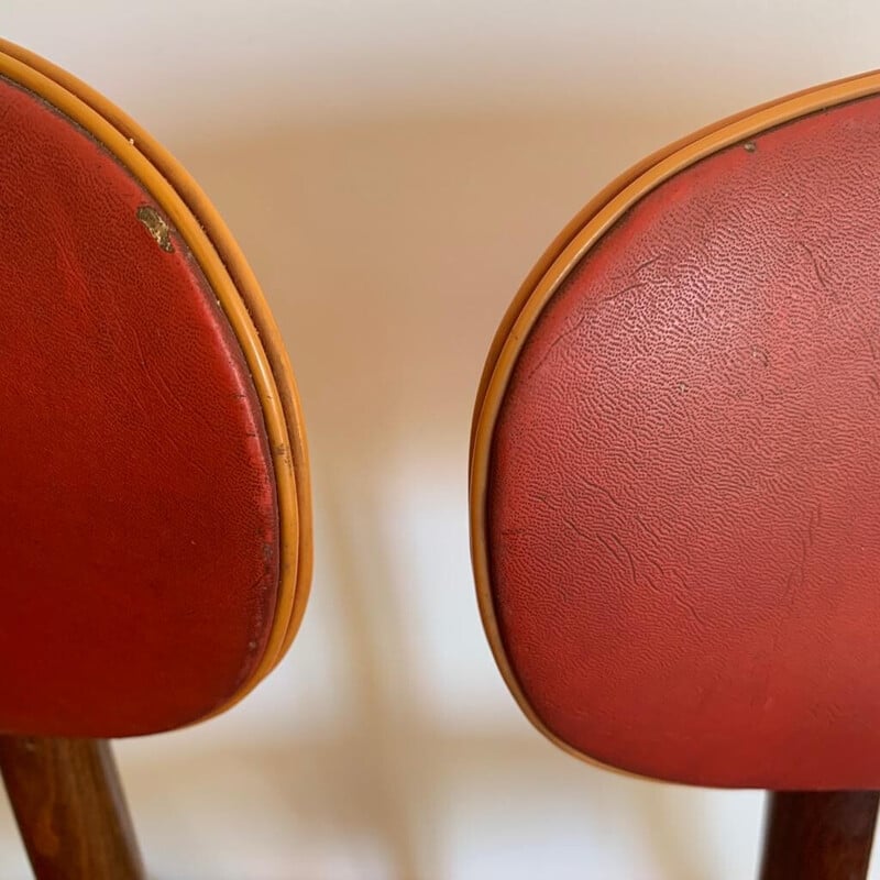 Pair of vintage red beech and skai chairs